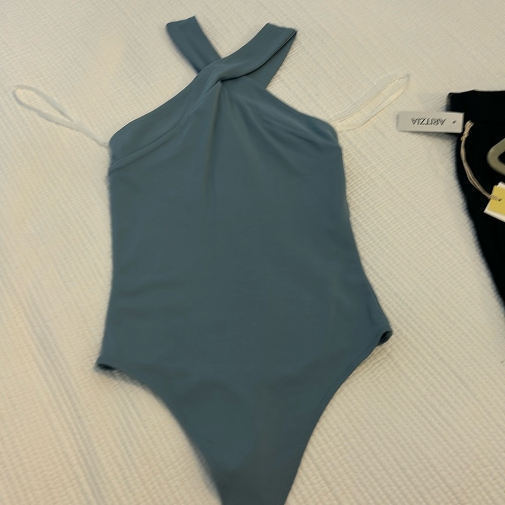 Brand new Babaton blue bodysuit XS never worn, but the tags have been removed